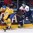 MINSK, BELARUS - MAY 16: Sweden's Gustav Nyquist #41 controls a bouncing puck with Slovakia's Jan Brejcak #91 chasing during preliminary round action at the 2014 IIHF Ice Hockey World Championship. (Photo by Richard Wolowicz/HHOF-IIHF Images)

